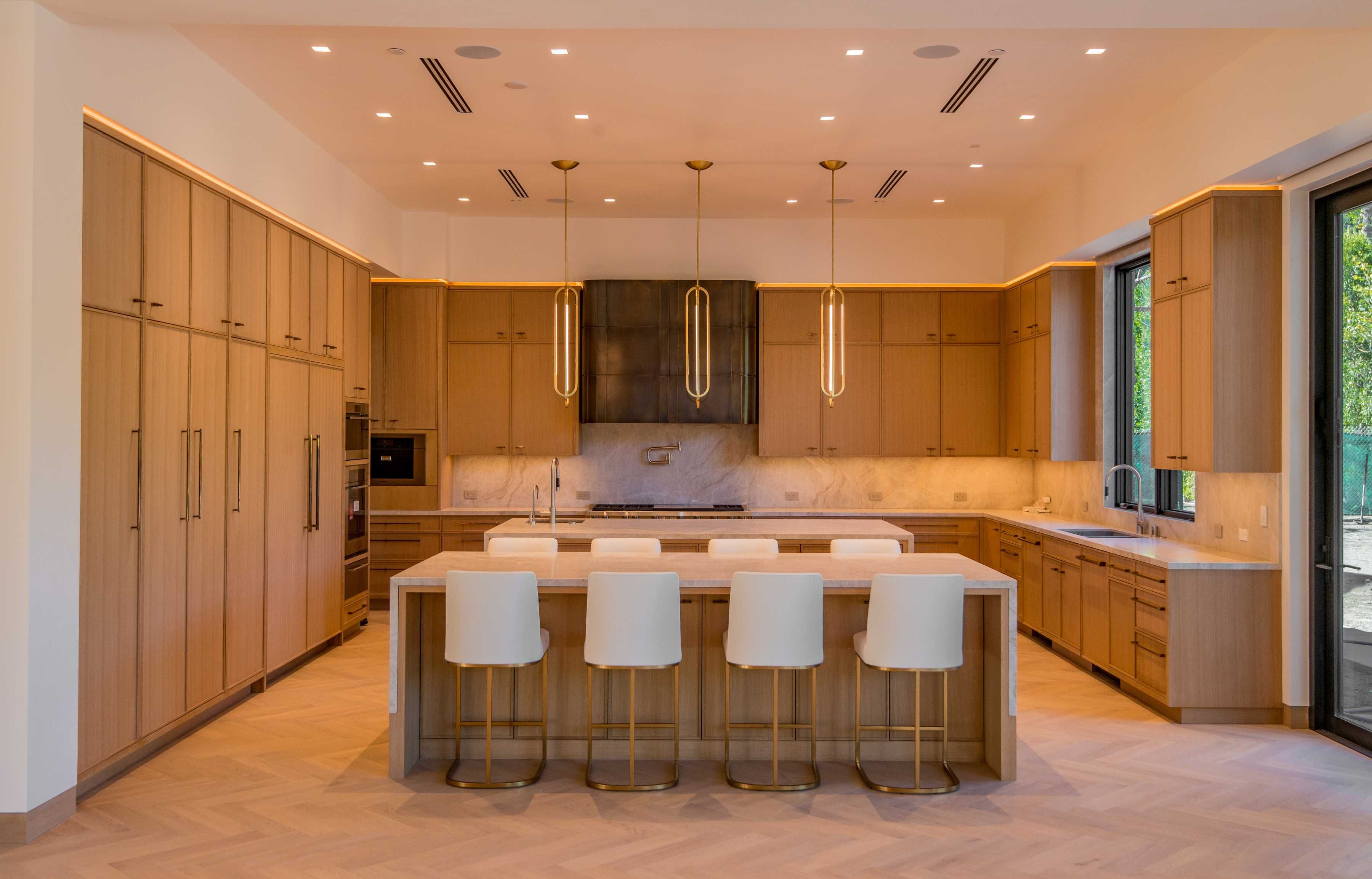 Custom white-oak kitchen in a Zuma Construction home